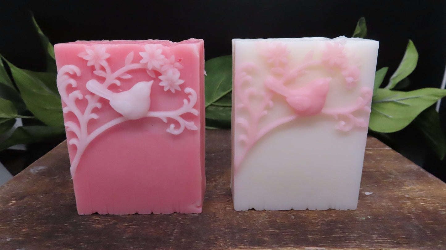 Pink variations of the handmade bird soap. White details on pink bar, pink details on white bar