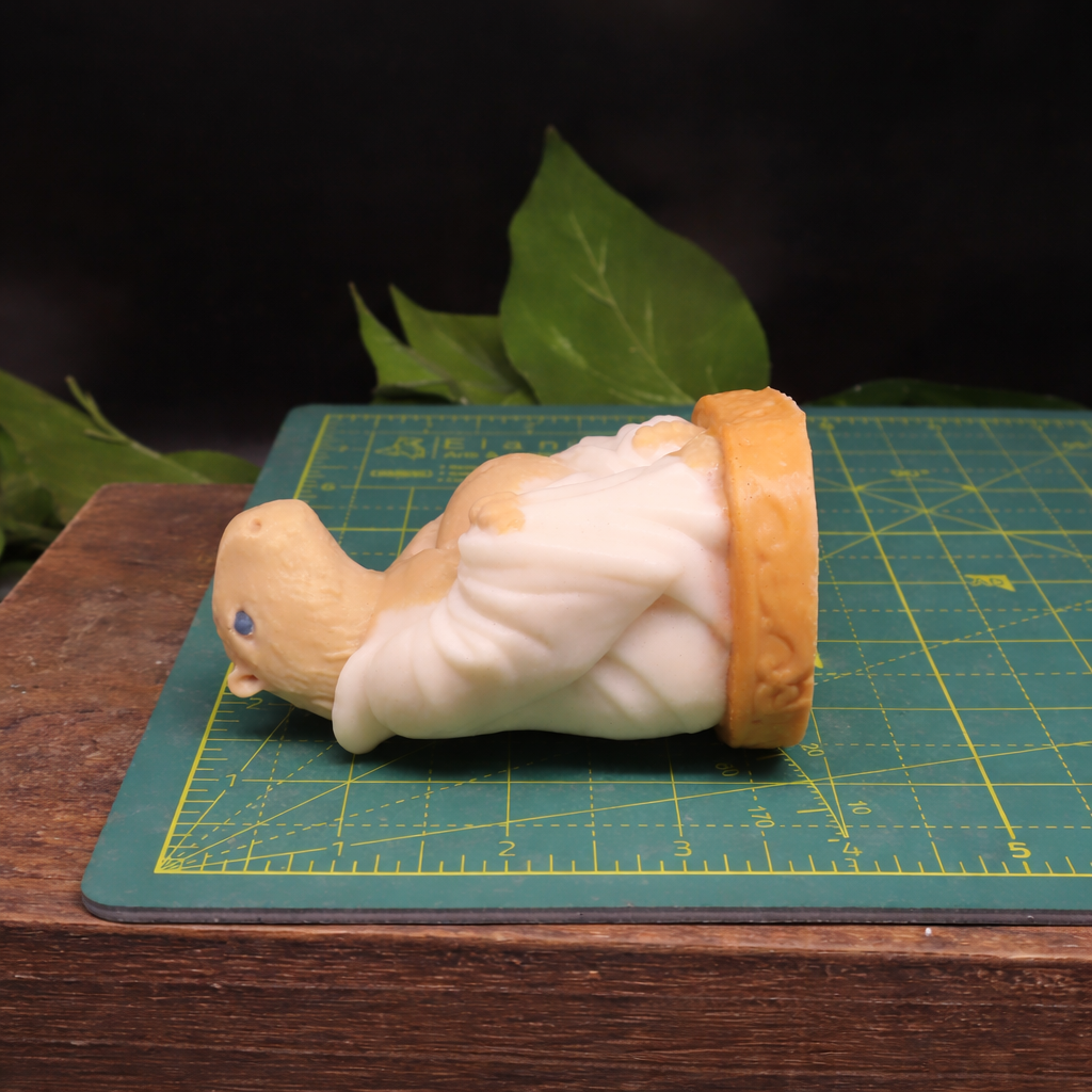 Handmade Goat Milk Soap Budda Capybara on cutting mat showing dimensions