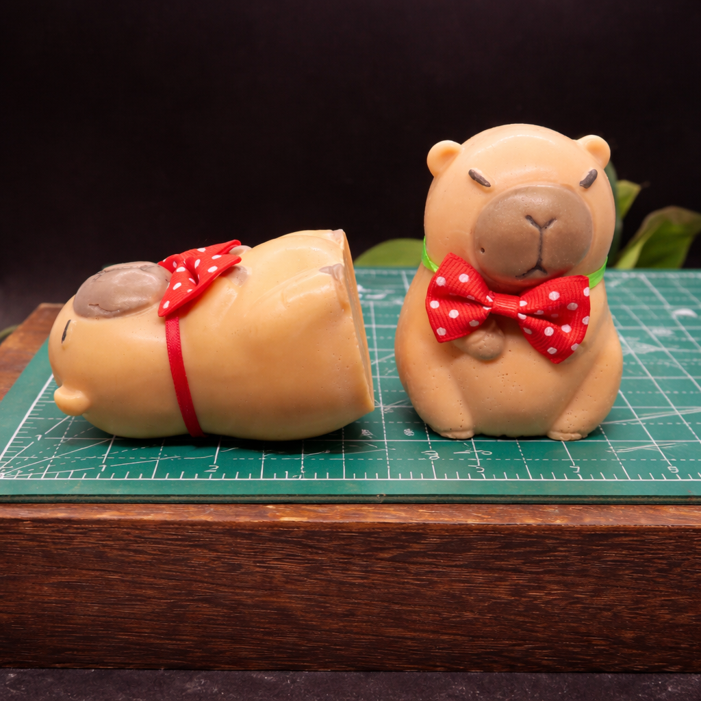 Handmade goat milk soap grumpy capybara on cutting mat showing dimensions best gift