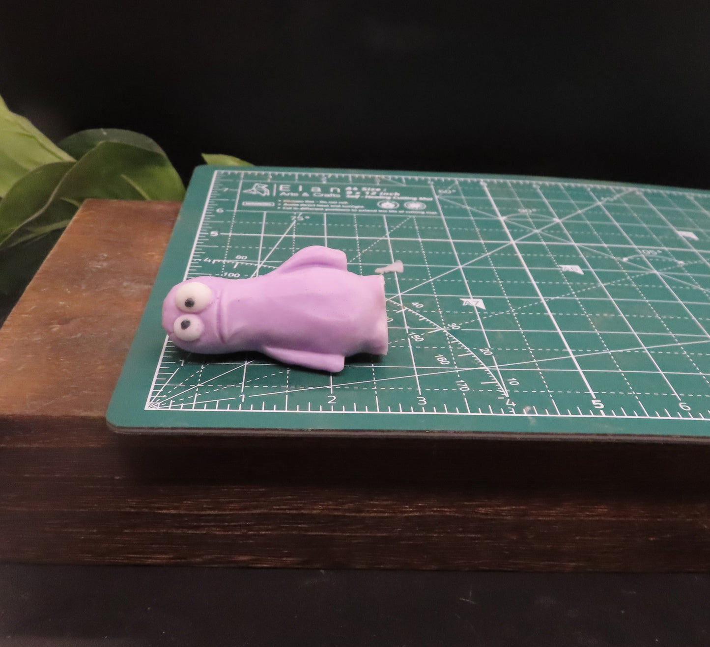 Small monster is 2.5 inches tall by approximately 1 inch wide at the widest point. fun gift