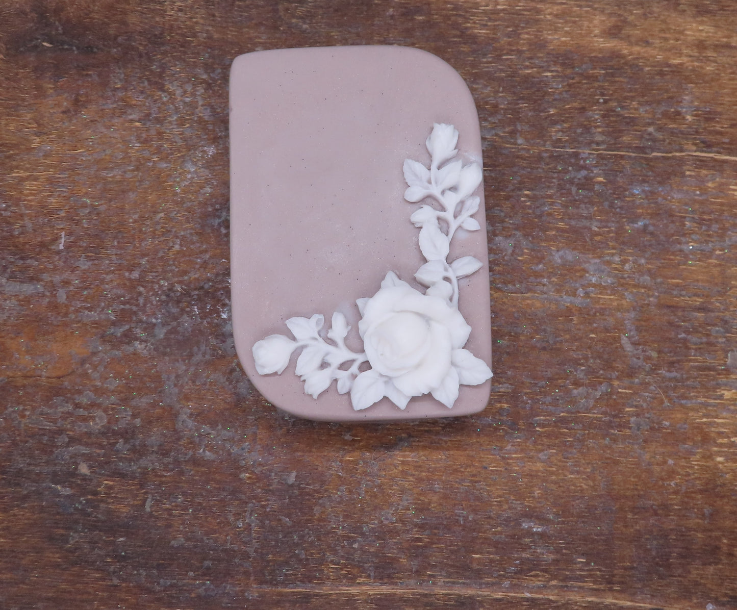 white rose on brown bar handmade soap