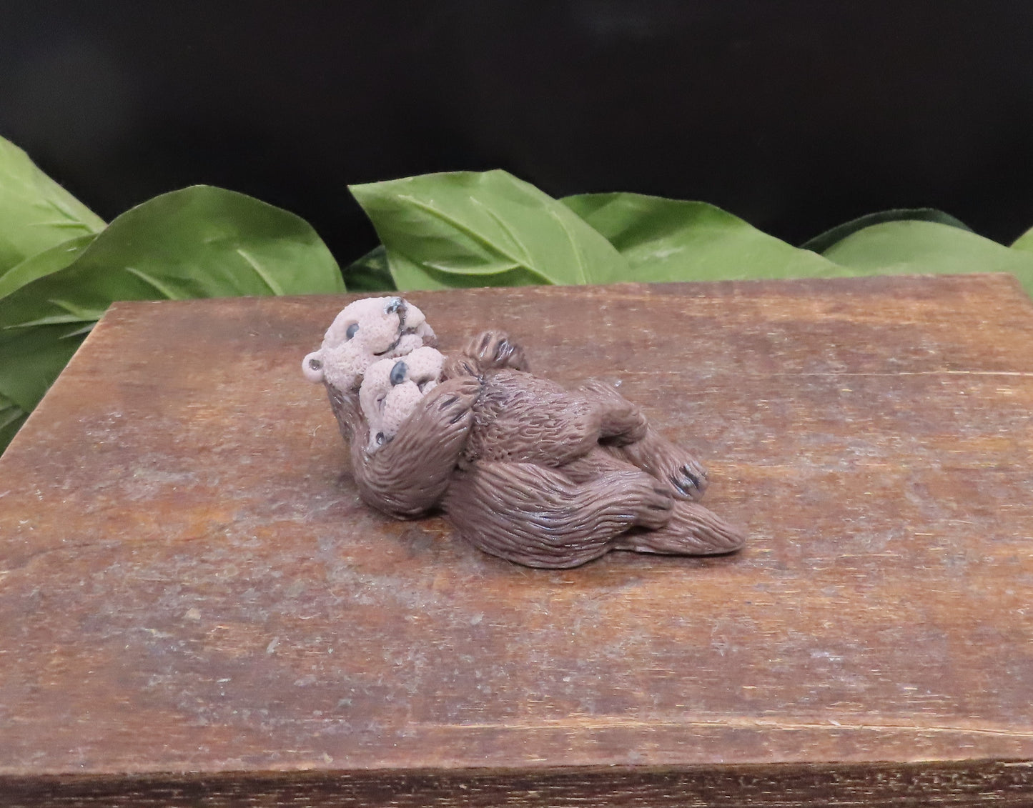 Handmade otter goat milk soap , light face coloring on dark brown body.