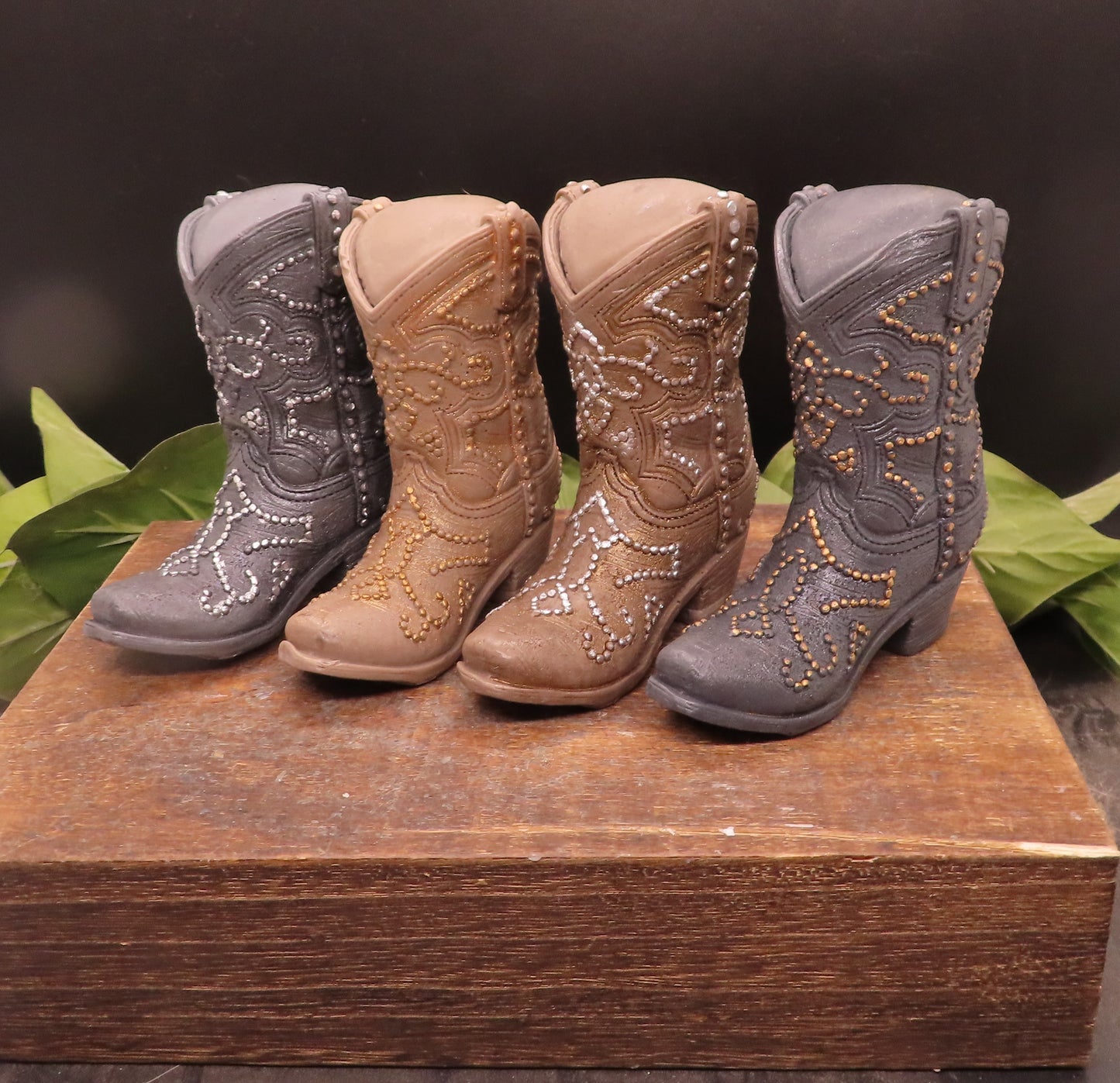 4 color variations of handmade cowboy boot goat milk soap