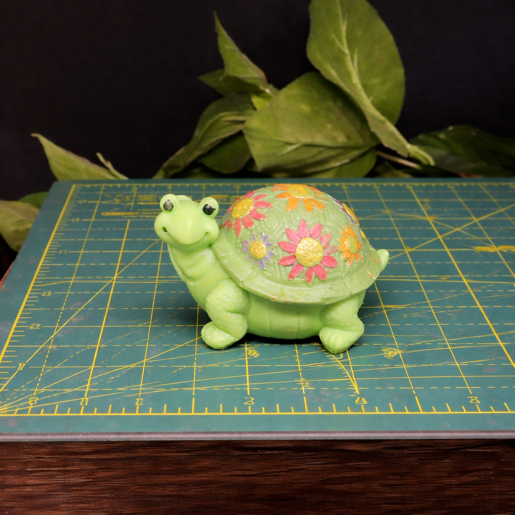 artisan floral turtle soap bar photographed for size and detail reference