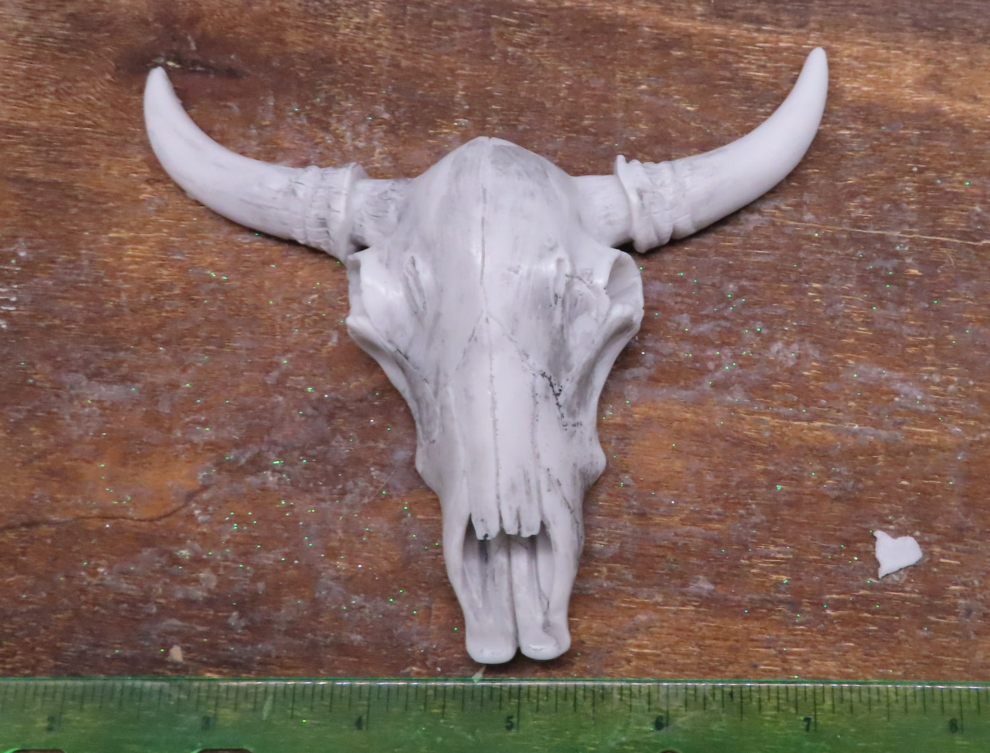 Steer skull goat milk soap approximately 4.5 inches x 4 inches.