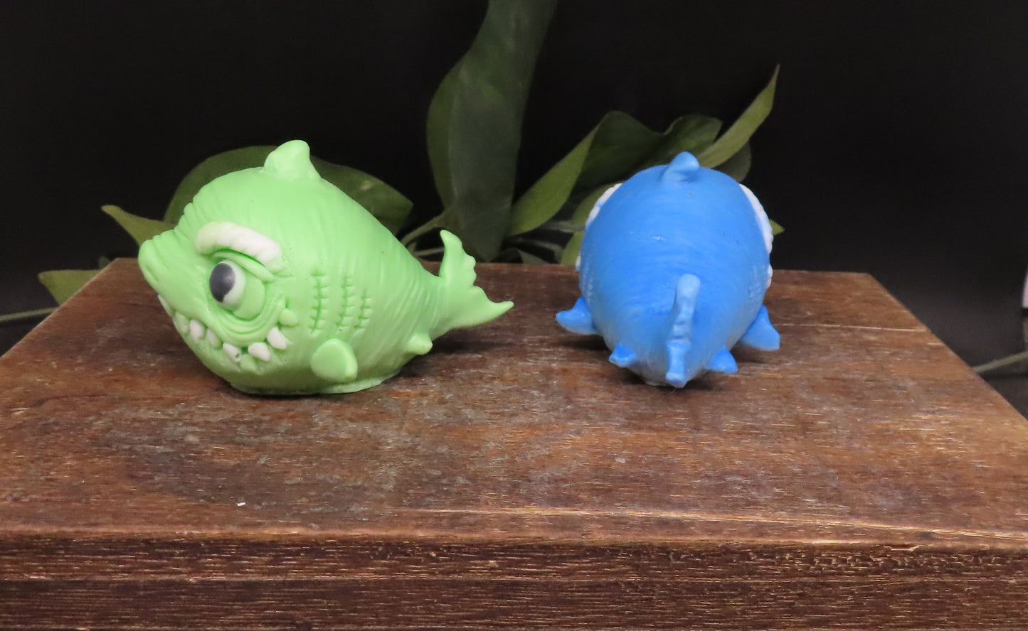 Two colorful shark-shaped hand soaps