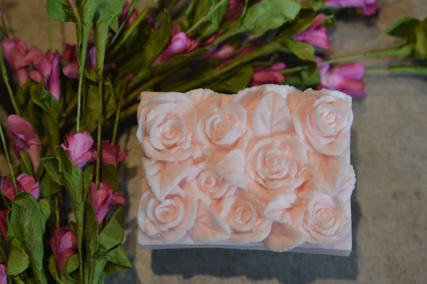 Set of 2 beautifully detailed handmade goat milk soap bars. Image of pink