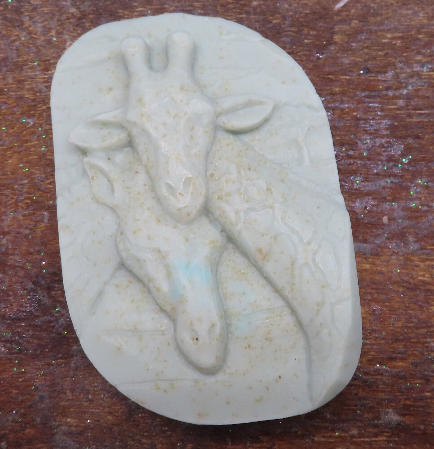 light gray color of 2 giraffe heads goat milk soap