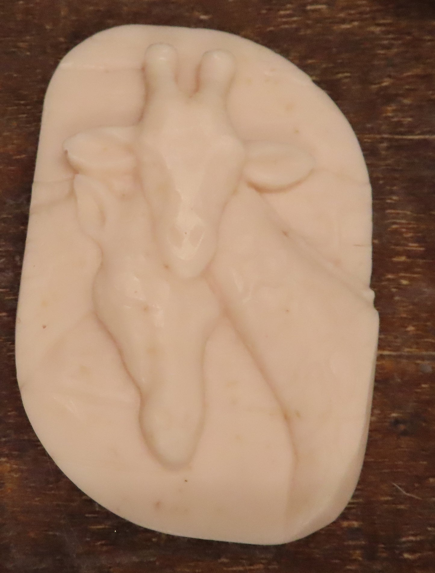 Handmade goat milk soap of 2 giraffe heads in tan
