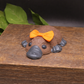 Close up detail of handmade platypus soap texture and bow, artisan goat milk novelty soap