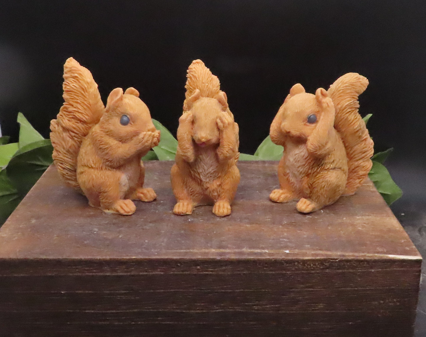 Decorative red squirrel animal soaps made from goat milk soap, arranged as a three-piece set for gift or bathroom display.