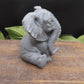 Elephants of wisdom reverse side view