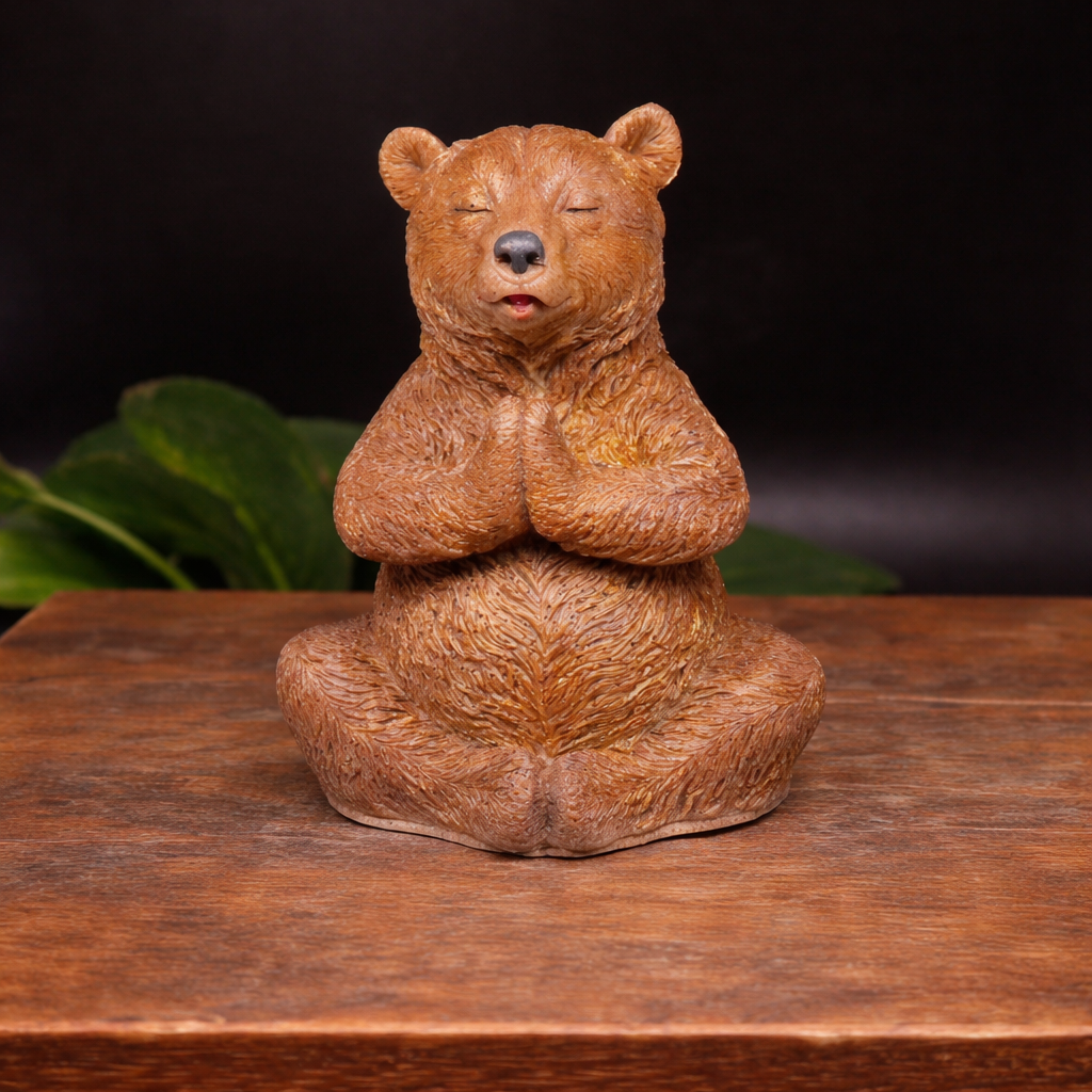 Handmade Brown Bear in prayer yoga position handmade goat milk soap on a wooden box. 