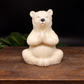 Handmade Yoga Polar Bear Goat Milk Soap sitting on a wooden box. 