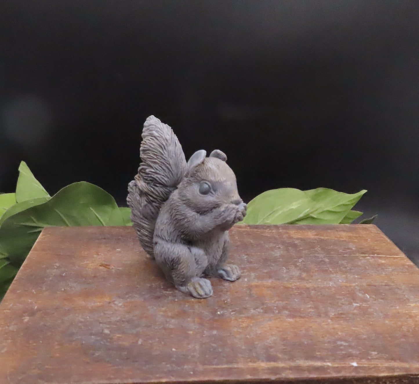 Handmade gray squirrel soap in speak no evil pose, crafted from goat milk soap as a whimsical decorative animal bath bar.