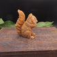 Handmade red squirrel soap in see no evil pose, crafted from goat milk soap as a whimsical decorative animal bath bar.