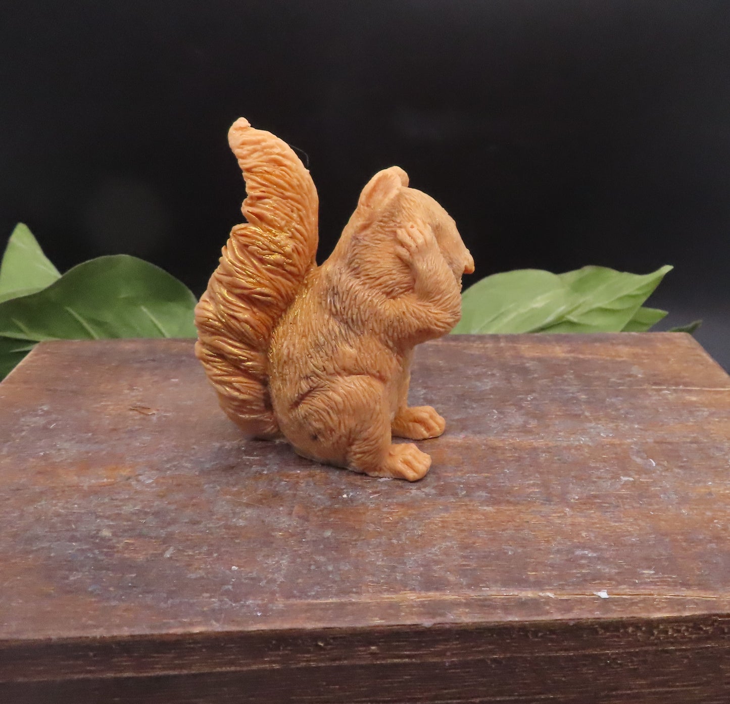 Handmade red squirrel soap in see no evil pose, crafted from goat milk soap as a whimsical decorative animal bath bar.