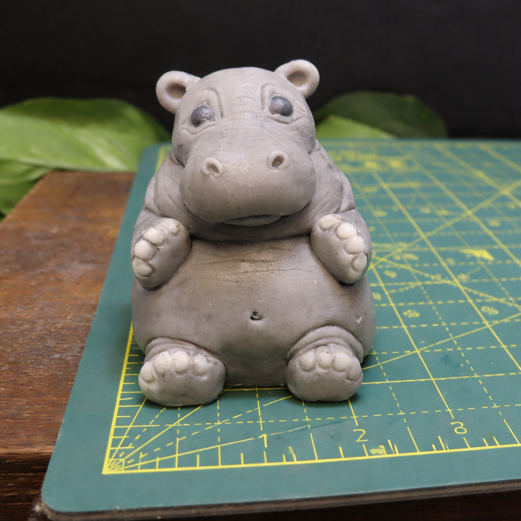 Hippo goat milk soap on cutting mat for size reference, animal shaped bath soap keepsake measurement view