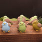 Several chubby goat milk soap birds facing different directions to show details.  Makes the perfect unique gift