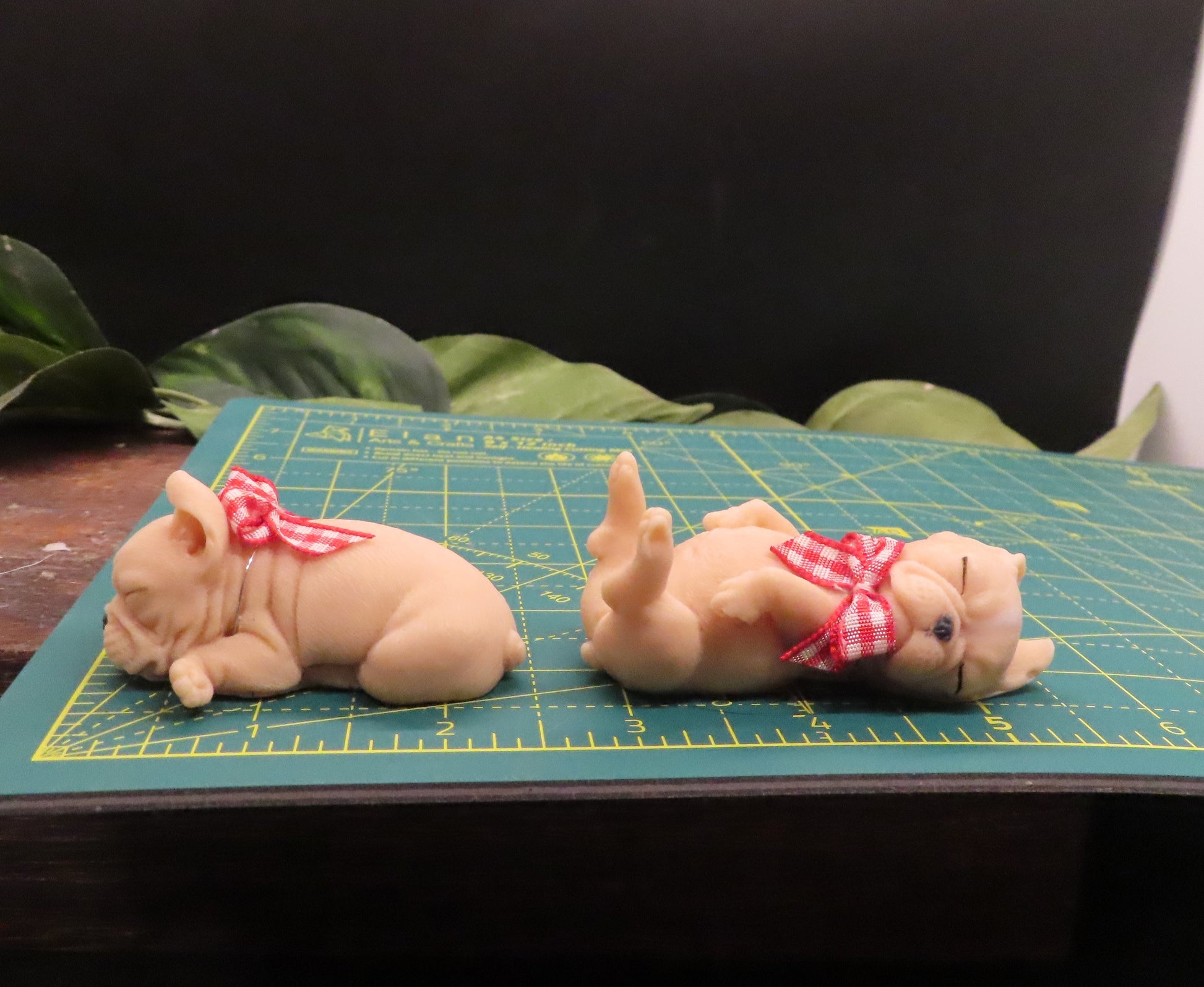 pups on cutting mat, approximately 2.5 inches long