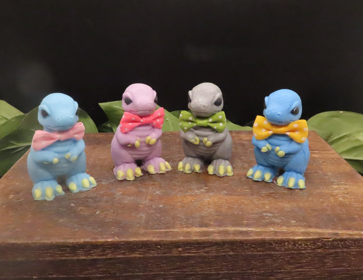 A group of mini t-rex goat milk soaps