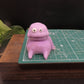 Chubby clay monster is 3 inches wide.  fun gift