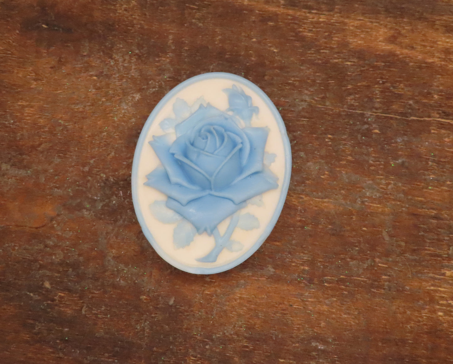 White with blue rose cameo goat milk soap