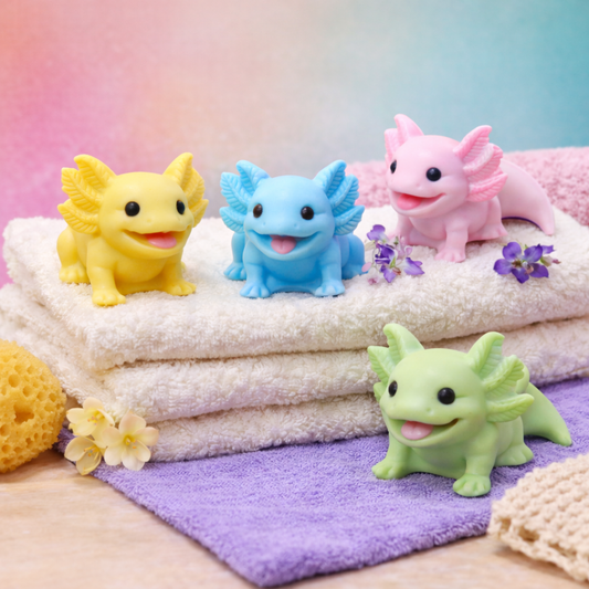 Lifestyle image of an axolotl goat milk soap keepsake gift, individually handcrafted collectible animal soap styled in a calming spa setting.