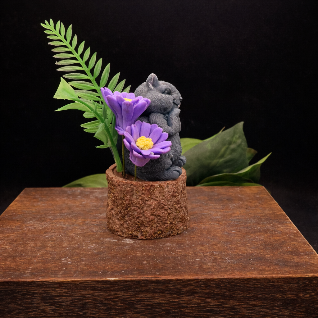 Side view Woodland creature goat milk soap arrangement with daisy soaps and rustic stump base