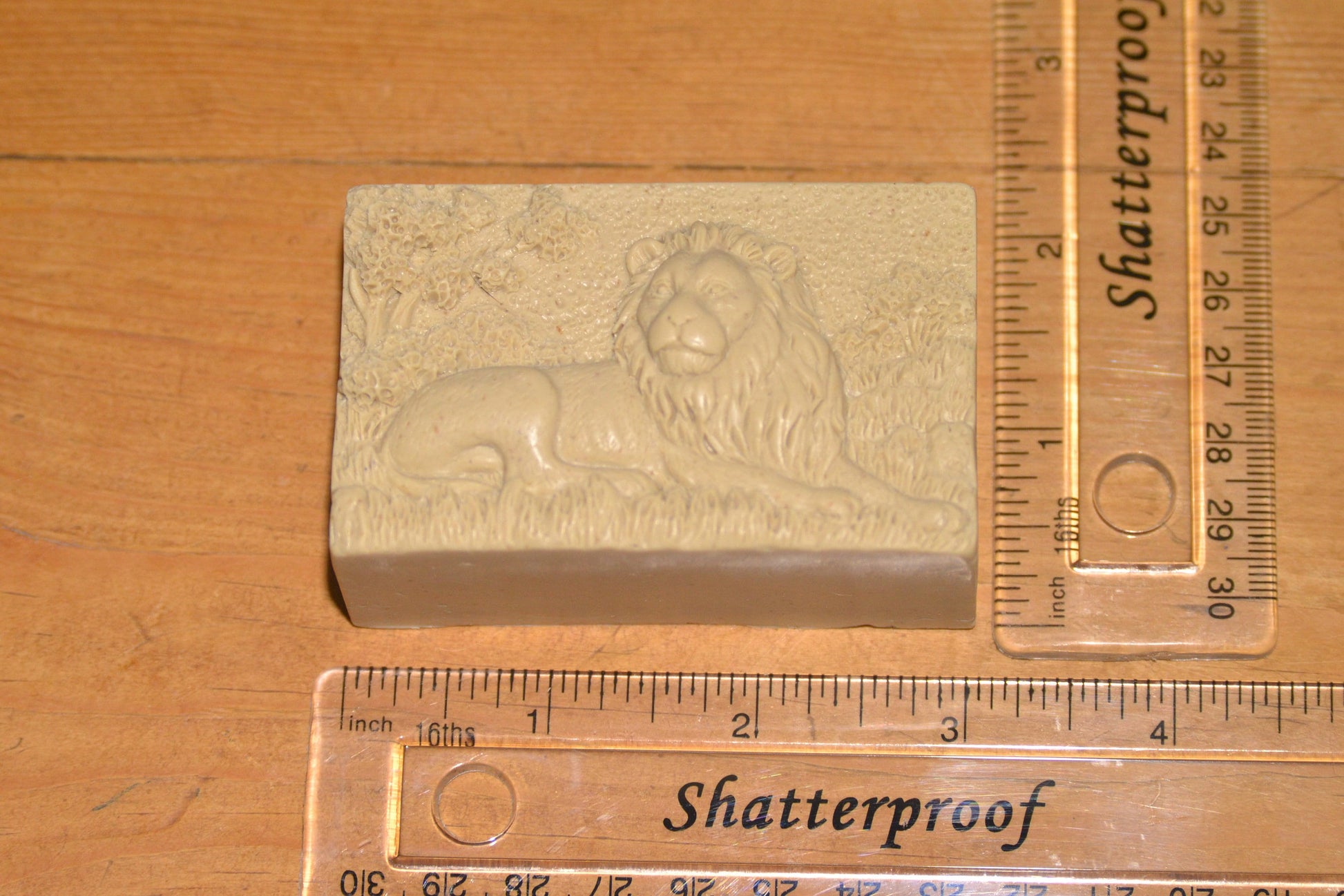lion measures 3 x 2.25 inches