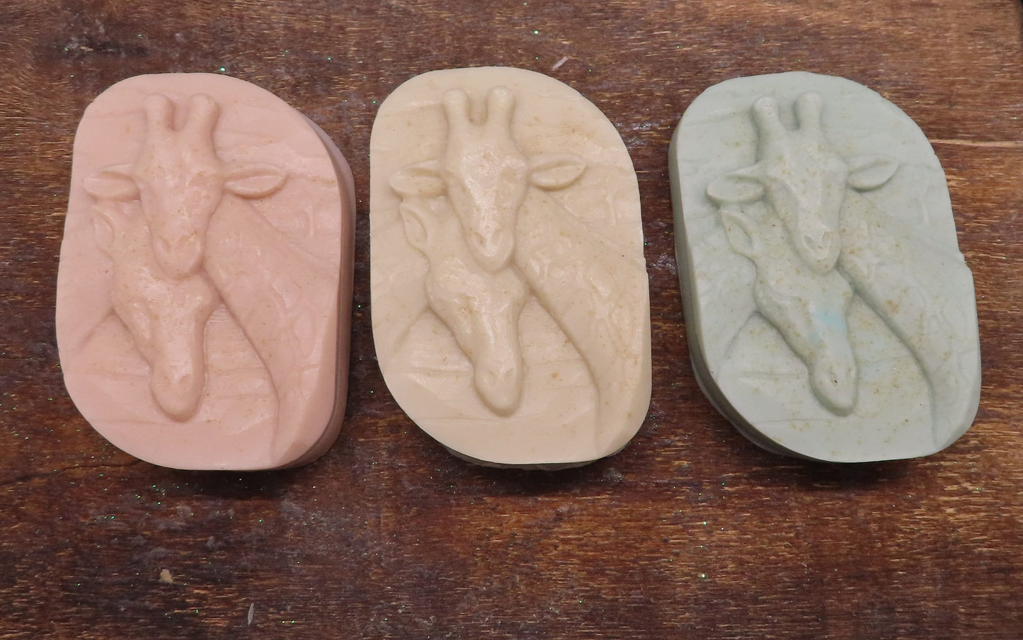 Handmade goat milk soap showing 2 giraffe heads